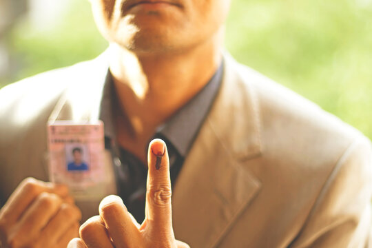 finger with the ink mark during polling in india-image