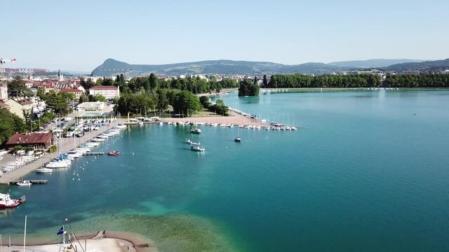boats on Annecy lake in France, aerial 4k footage, summer travel destination in Europe