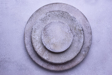 Fototapeta na wymiar Handmade handcrafted concrete plates and bowls