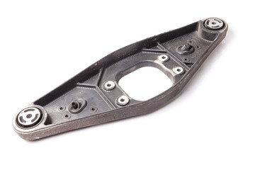 Obraz premium The back of the metal spare part is the transmission support for replacement during car repair on a white isolated background in a car service or for sale at an auto-parsing.