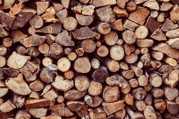 chopped wood wall, fuel for the winter
