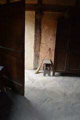 Broom Leaning on Bench