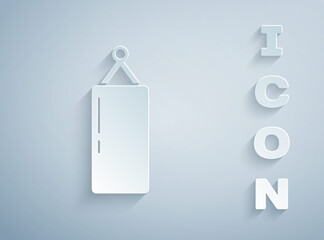 Paper cut Punching bag icon isolated on grey background. Paper art style. Vector.