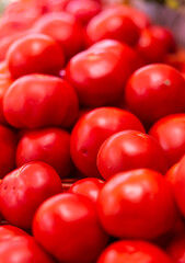 red tomatoes background. raw tomatoes , closeup tomato background, tomatoes closeup