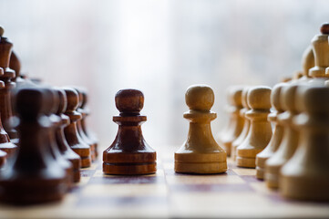 Chessmen on a chessboard, white background, Chess pieces on a chessboard - obrazy, fototapety, plakaty