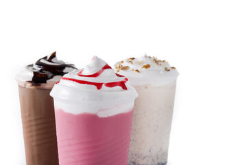 Strawberry, chocolate and white iced milkshakes isolated on white background. Copy space	