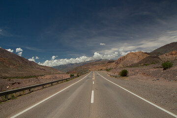 Transport. Traveling along the asphalt desert highway across the arid mountains. 
