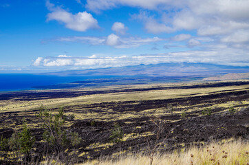 Panoramic view over lava fields and coast line in Volcanoes National Park on Big Island in Hawaii...