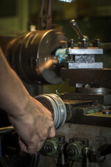 Lathe machine working in workshop