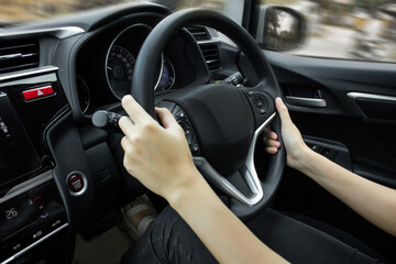 Hands on the steering wheel