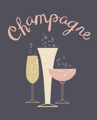 Variety of glasses of champagne with lettering