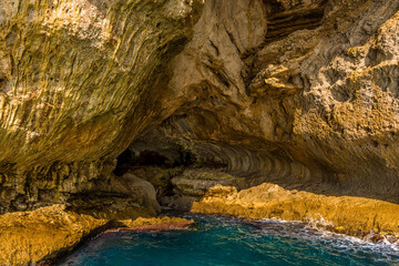 A wavecut notch marks the base of the White Grotto on the Island of Capri, Italy