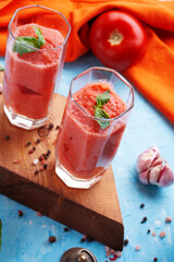  classic spanish raw eating cold soup Gazpacho served  in glasses. food recipe. healthy concept.