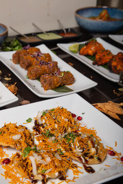 On the table different dishes of Indian cuisine. Isolated image