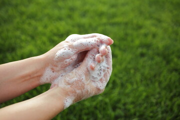 Fototapeta premium Washing hands rubbing with soap man for corona virus prevention, hygiene to stop spreading coronavirus. Death to germs