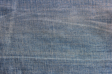 Jeans denim fabric texture background. Classic pale blue jean cloth surface, seamless casual jeans...