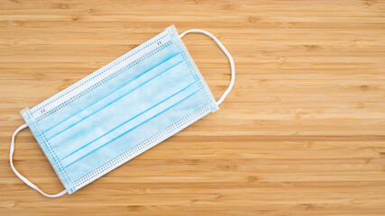 mask prevent coronavirus. Medical hygienic on wood background. protection flu against. pandemic virus disease. Healthcare Covid 19 outbreak contamination hygiene concept. copy space.