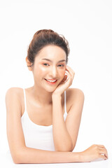 Beautiful Asian woman looking at camera smile with clean fresh skin
