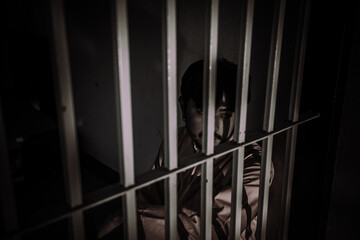 Hands of men desperate to catch the iron prison,prisoner concept,thailand people,Hope to be free.