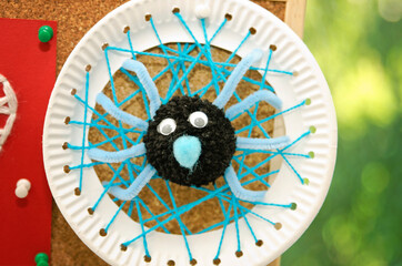 Funny spiders children's craft. Cute Halloween decoration.