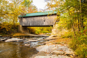 The Montgomery Covered Bridge, also known as the Lower Covered Bridge is a wooden covered bridge that carries Montgomery Road across the North Branch of the Lamoille River in Waterville, Vermont