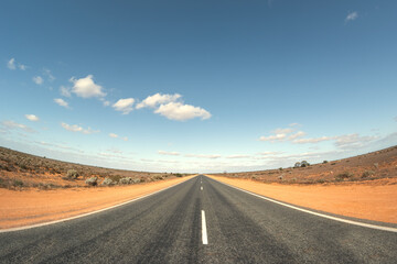 Fototapeta na wymiar Road in Australia with curved horizon