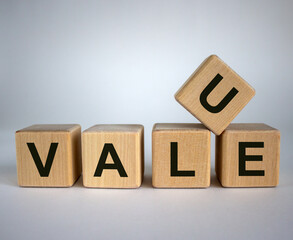 Concept word 'value' on wooden cubes on a beautiful white background. Business concept.