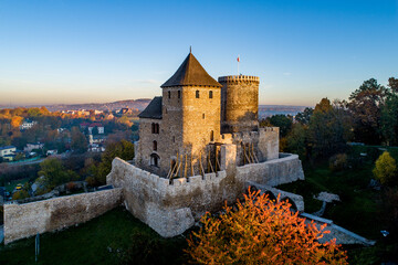 Medieval gothic castle in Bedzin, Upper Silesia, Poland. Aerial view in fall in sunrise light