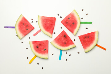 Composition with fresh watermelon slices on white background, top view