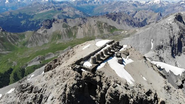 Mount Chaberton aerial view from airplane, peak of mountain in the Cottian Alps located in the French department of the Hautes-Alpes with forts battery on the top.