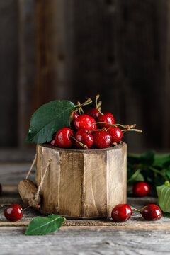 Fresh sweet cherries on table with water drops 