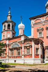 Obraz premium The Church of the Introduction to the temple was built and improved for 50 years, until it acquired an extant appearance. White decorations Shine on the traditionally red walls. 