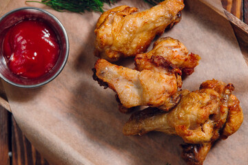 fried chicken on a plate in a restaurant, nuggets with ketchup