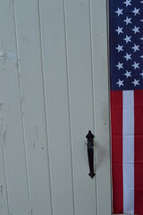 american flag on fence