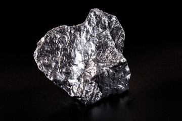 Chrome elemental specimen sample isolated on black background, mining and gemstone concept.