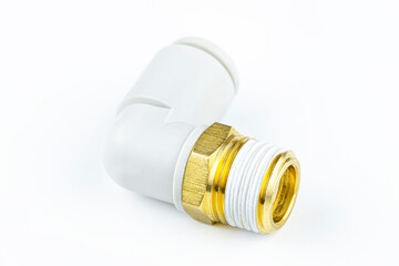 Macro shot of a white, pneumatic elbow fitting for a plastic tube with a 1/2 inch brass external thread, isolated on a white background with a clipping path.