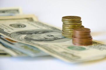  the pen lies on a white background and money. tuition fee. financing