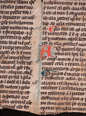 A manuscript on vellum of St Thomas Aquinas written in the twelfth or thirteenth century with rubricated red initials. 