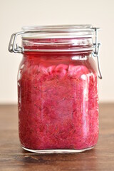 homemade red cabbage sauerkraut in glass container