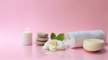 Obraz na płótnie Canvas Spa setting and Spa background composition with white gardenia flower on pink background. Banner