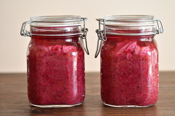 homemade red cabbage sauerkraut in glass container