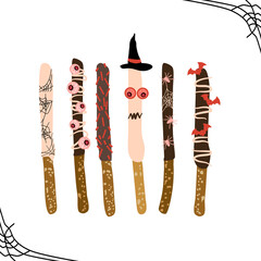 Chocolate covered Halloween pretzels. Sweet and salty sticks topped with sprinkles, candy eyes, glaze cobwebs. Dipped baked rods.Halloween night party invitation, greeting card. Trick or treat candies