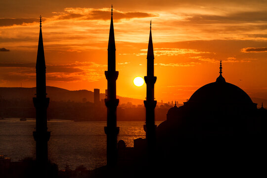 Blue Mosque in silhouette at the sunrise, Istanbul, Turkey.