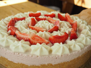 cake with fresh strawberries and cream. decoration with fruit