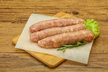 Raw pork meat sausages for grill