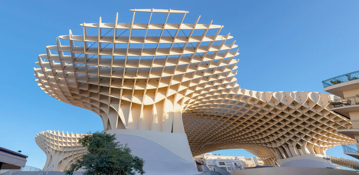 Seville, Spain - December 15, 2018: View of Metropol Parasol, also know as Setas de Sevilla​, in Plaza Encarnacion, Seville, Andalusia, Spain