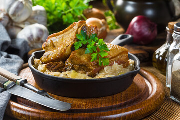 Traditional spare ribs baked in sauerkraut.