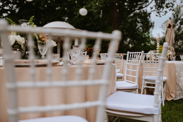 Beautiful pastel floral decoration for outdoor celebration by the river