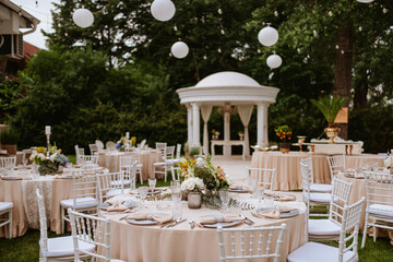 Beautiful pastel floral decoration for outdoor celebration by the river