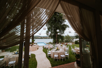 Beautiful pastel floral decoration for outdoor celebration by the river